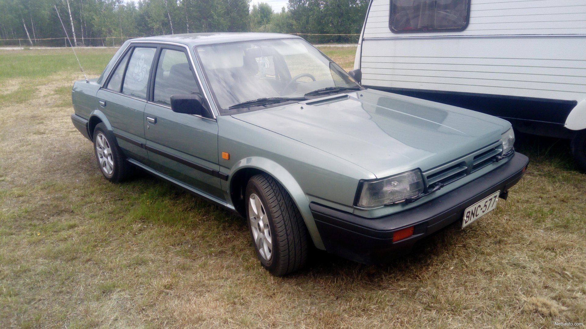 Автомобиль nissan bluebird